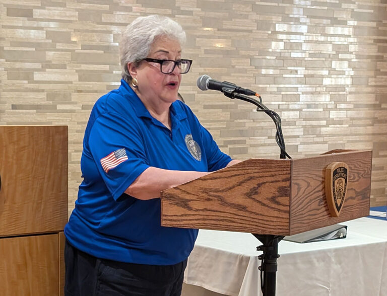 VIP's Carmen Rivera speaks at a podium