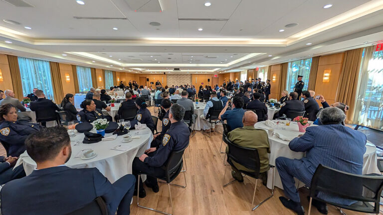 Tables of attendees looking on at the 48th Precinct Community Council Annual Awards Breakfast