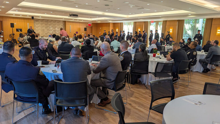 Guests at the 48th Precinct Community Council Annual Awards Breakfast sitting at tables