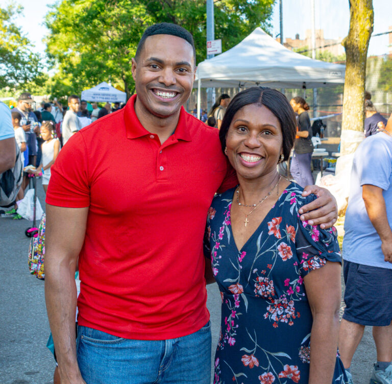 Leadership and elected official pose at health fair outside VIP Community Services building in the Bronx