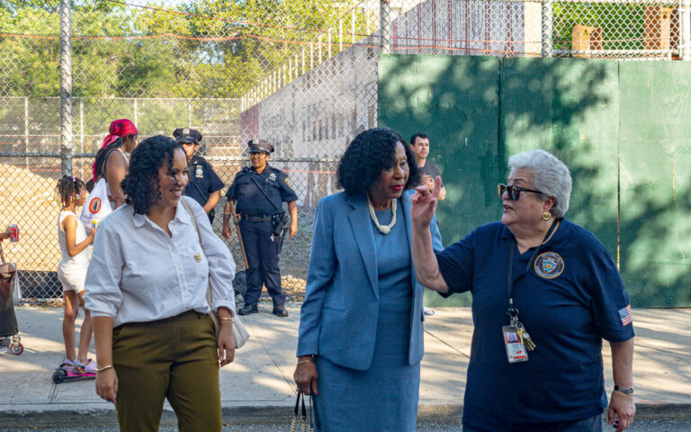 Leadership converse at health fair outside VIP Community Services building in the Bronx