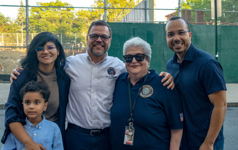 Leadership converse atLeadership and elected official pose at community event outside VIP Community Services building in the Bronxhealth fair outside VIP Community Services building in the Bronx
