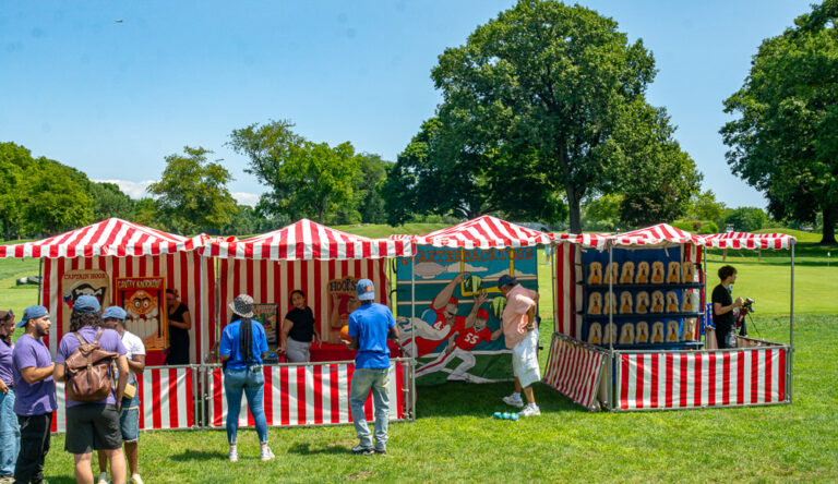 Carnival games at community fair outside VIP Community Services building in the Bronx