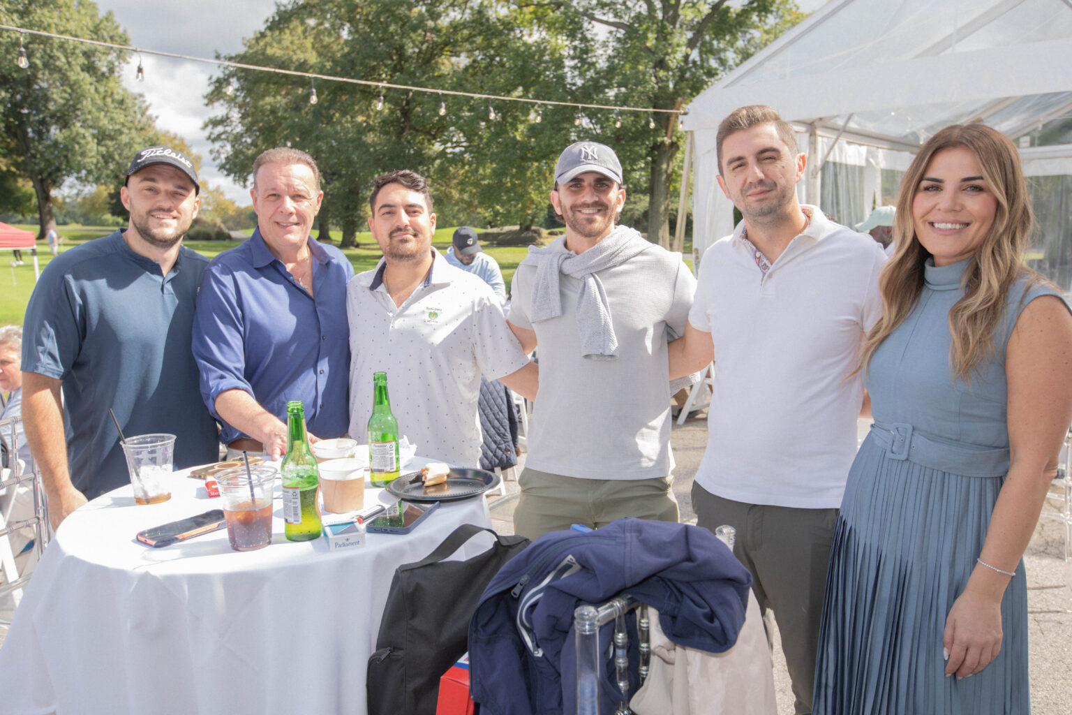 Attendees pose for photo at VIP's Inaugural Golf Outing 2026.