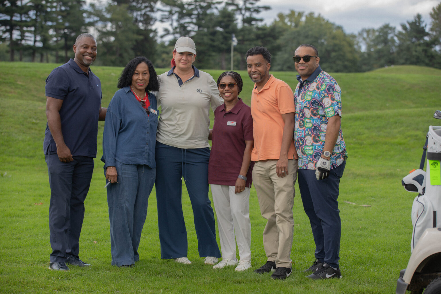 President and CEO Debbian Fletcher-Blake and Executive Vice President and Chief Operations Officer Opal Dunstan, poses with attendees.